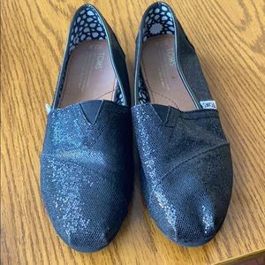 Tom’s black sparkle flats